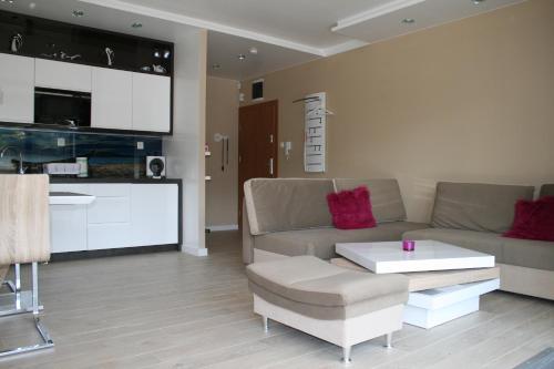 Coin salon dans l'établissement Apartament Porta Mare 122