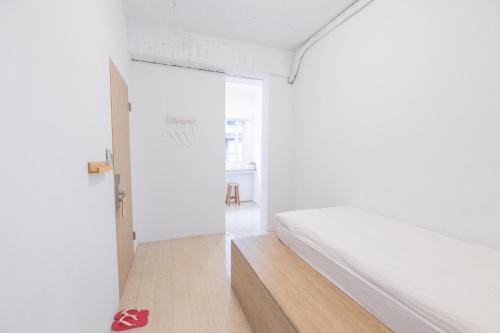 Postel nebo postele na pokoji v ubytování OwlStay Flip Flop Hostel - Garden