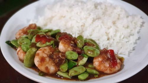 a plate of food with rice and shrimp at นิทานคำกลอน 2 Nithankumkon 2 in Amphawa