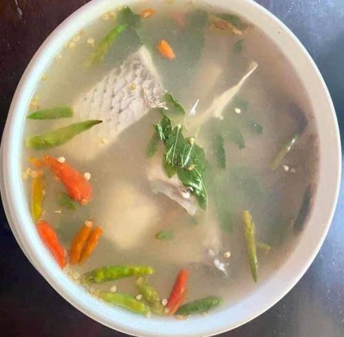 a bowl of soup with vegetables in it at นิทานคำกลอน 2 Nithankumkon 2 in Amphawa