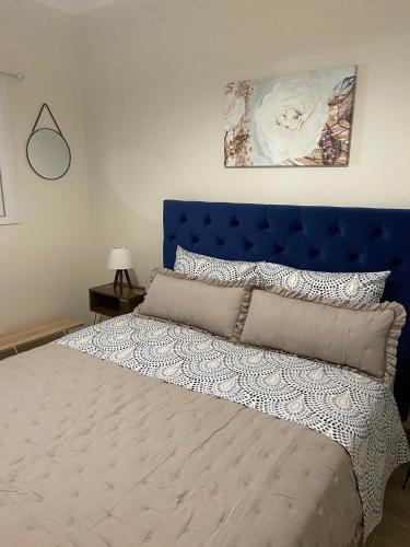 Postel nebo postele na pokoji v ubytování Kaldis Apartment