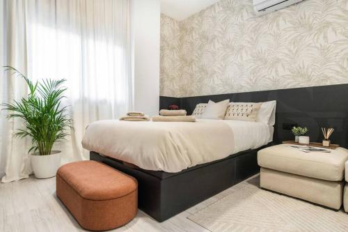 Posteľ alebo postele v izbe v ubytovaní Chic intimate studio in the heart of Malaga by REMS
