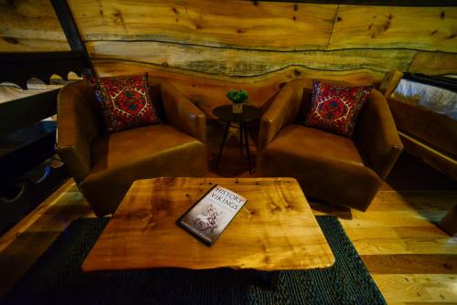 a living room with two couches and a coffee table at Vikings Villages Resort in Guilford