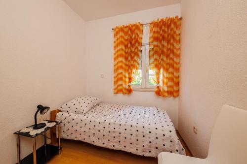 Postel nebo postele na pokoji v ubytování Apartman Marija