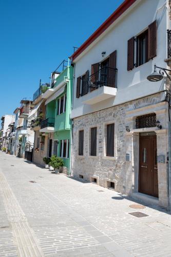 an empty street in a town with buildings at Casa en el Lago -Luxury apartments in the historical center of Ioannina in Ioannina