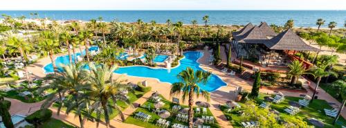 an aerial view of a resort with a swimming pool at Puerto Antilla Grand Hotel in Islantilla