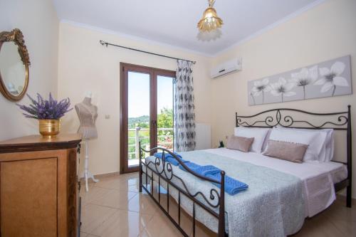 Postel nebo postele na pokoji v ubytování Green Lagoon Villa by "elite"