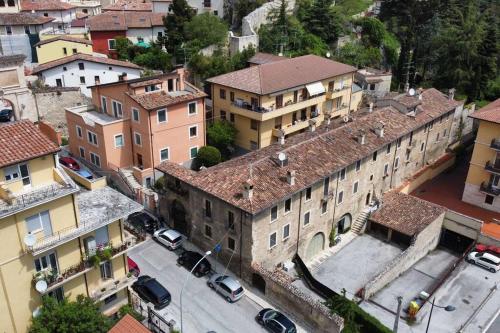 an aerial view of a city with buildings at Caldora Apartment in LʼAquila