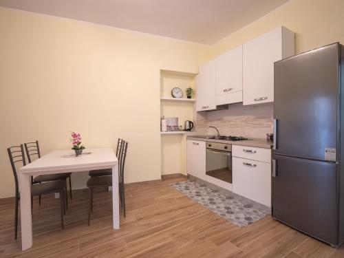 Kuchyň nebo kuchyňský kout v ubytování Camelia House