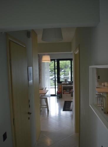 Η κουζίνα ή μικρή κουζίνα στο Mathesi apartment Sea front