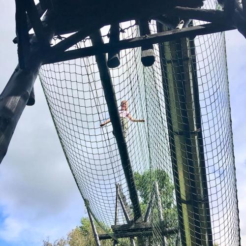 a person is riding on a roller coaster at Eclectic Barn - Pergola & Dog-Friendly Garden in Calne