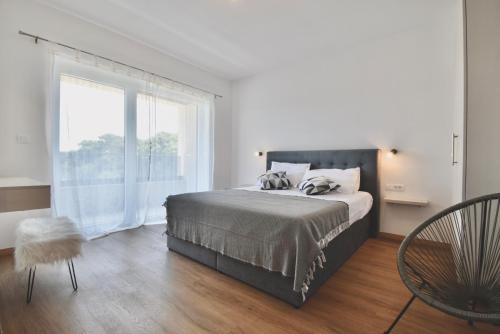Ένα ή περισσότερα κρεβάτια σε δωμάτιο στο New amazing holiday house with pool