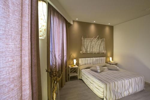 Hotel Tirrenoにあるベッド