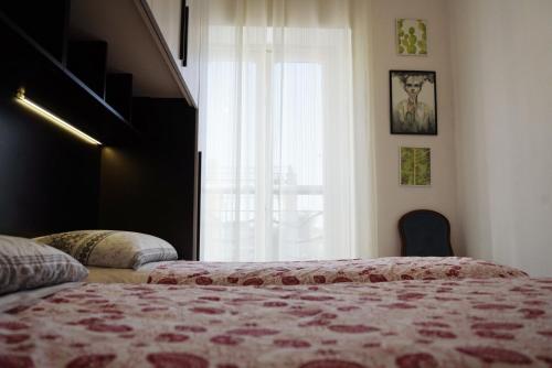 Postel nebo postele na pokoji v ubytování Costa e Mare