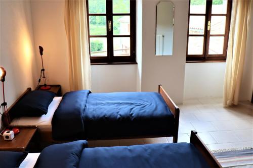 Postel nebo postele na pokoji v ubytování Casa Cocola