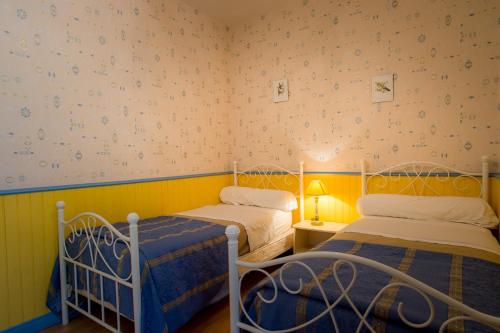 Ένα ή περισσότερα κρεβάτια σε δωμάτιο στο Holiday home Saussignac