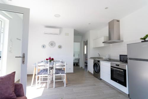 Kuchyň nebo kuchyňský kout v ubytování Solpor Galitrips - Apartamentos Corcubión