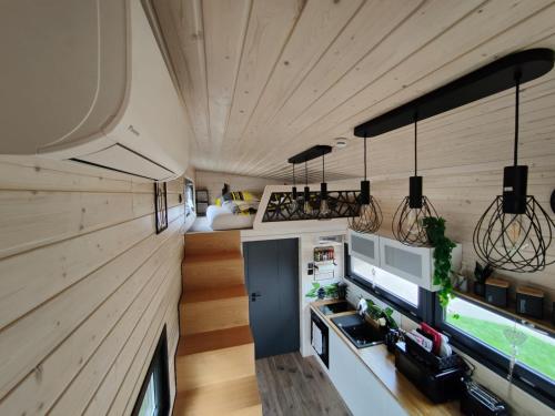 an interior view of a kitchen in a tiny house at Mariolas Tinyhouse in Markt Nordheim