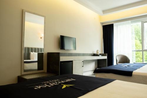 リゼにあるNewarise Hotelのギャラリーの写真