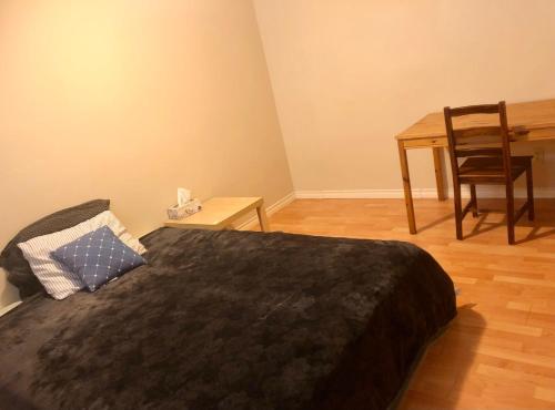 Chestermere room with Queen sized bed
