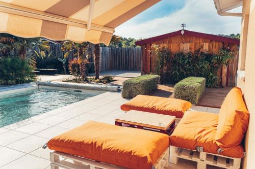 Photo de la galerie de l'établissement Superbe Villa avec Piscine à 10 min de l'Océan, à Mézos