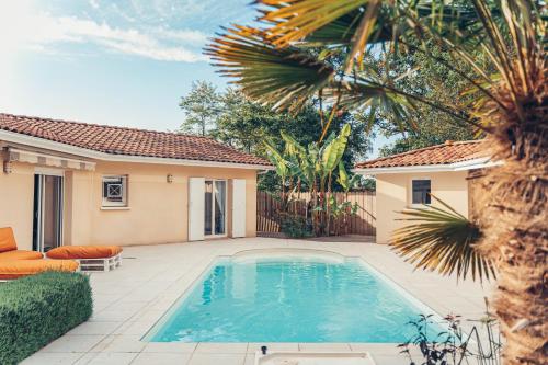 Photo de la galerie de l'établissement Superbe Villa avec Piscine à 10 min de l'Océan, à Mézos
