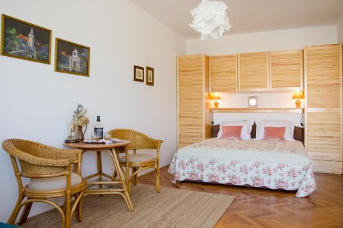 מיטה או מיטות בחדר ב-Apartmani Ina Pag