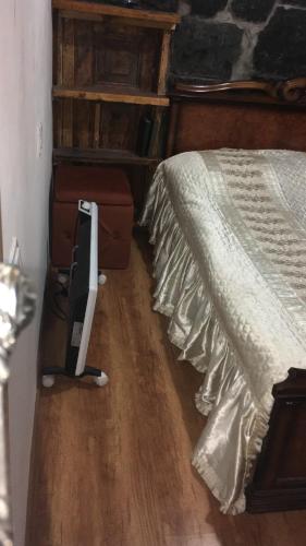 Postel nebo postele na pokoji v ubytování Old House Gyumri