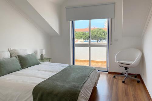 Ένα ή περισσότερα κρεβάτια σε δωμάτιο στο XB House