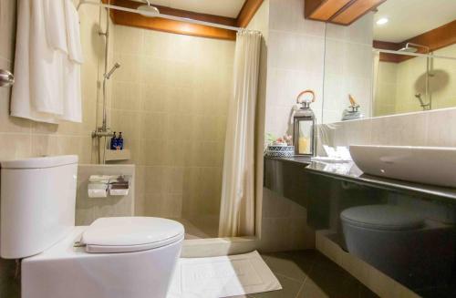 Koupelna v ubytování Tohsang Heritage Ubon Ratchathani Hotel