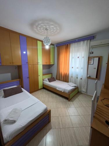 Delars Apartaments tesisinde bir odada yatak veya yataklar