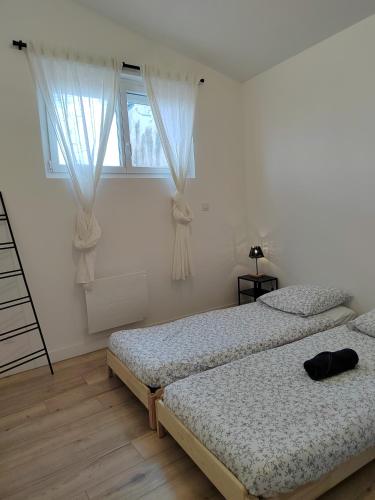 Posteľ alebo postele v izbe v ubytovaní Moderne et chaleureux duplex en centre-ville