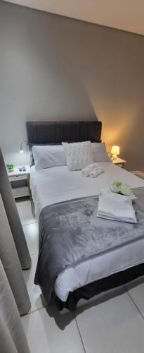 Ένα ή περισσότερα κρεβάτια σε δωμάτιο στο 801 Guesthouse