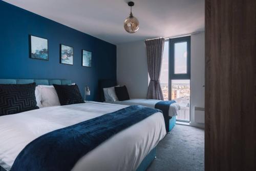 Voodi või voodid majutusasutuse Luxury City Apartment in Birmingham toas