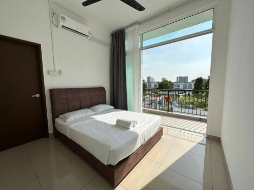 a bedroom with a bed and a large window at [OFFICIAL] Desaru Villa Resort @ Arcadia in Desaru