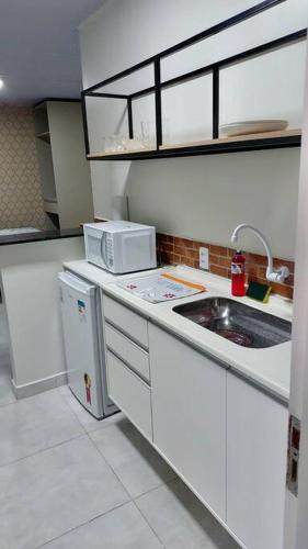 Η κουζίνα ή μικρή κουζίνα στο Apartamento Studio Centro