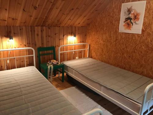 Voodi või voodid majutusasutuse Sommardröm toas