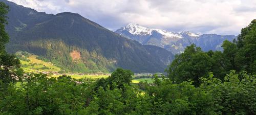 a view of a valley with mountains in the background at Fewo Hereinspaziert in Schwendau