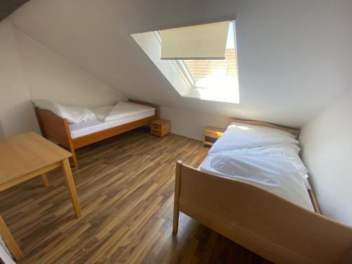 Krevet ili kreveti u jedinici u objektu Zimmer im Monteurhaus in Emden