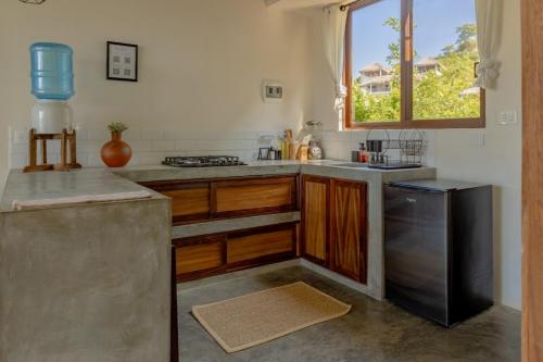Cuisine ou kitchenette dans l'établissement Casa Mauna Boutique Hotel