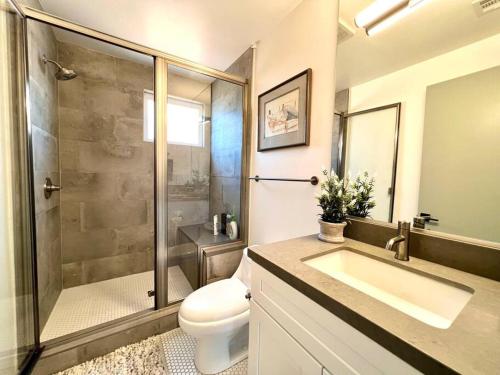 A bathroom at Luxury K-Town Dwelling with private rooftop deck.