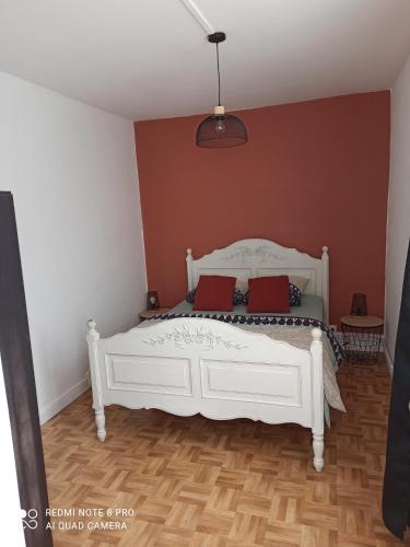 En eller flere senge i et værelse på Appartement hyper centre Dunkerque