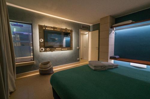 Postel nebo postele na pokoji v ubytování Euphoria Resort