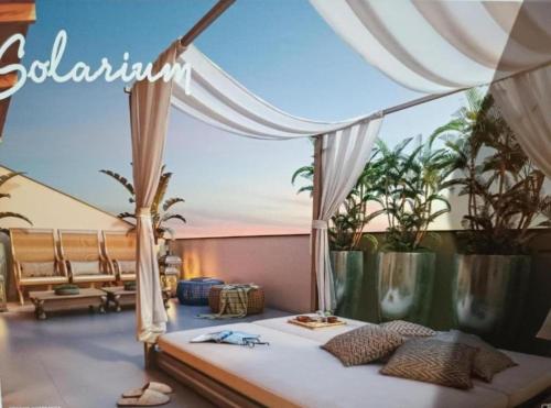 a bedroom with a bed with a canopy at Wanderlust Experience Hotel in Campos do Jordão