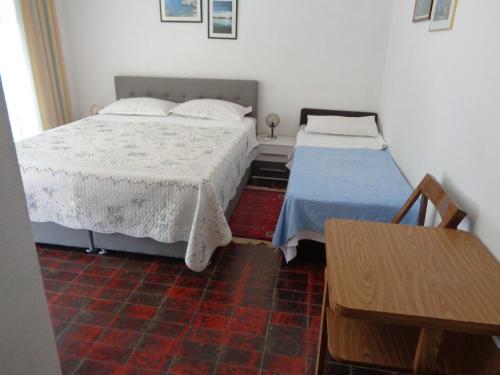 Ένα ή περισσότερα κρεβάτια σε δωμάτιο στο Pansion Danijela