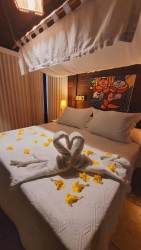Ένα ή περισσότερα κρεβάτια σε δωμάτιο στο Siri Paraiso Hotel