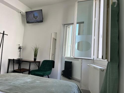 Кровать или кровати в номере Hotel TULTY
