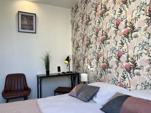 Кровать или кровати в номере Hotel TULTY