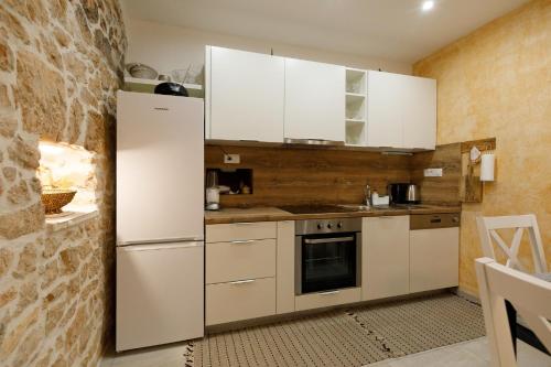Η κουζίνα ή μικρή κουζίνα στο Studio apartman "Stara kuća"