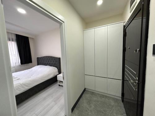 Ένα ή περισσότερα κρεβάτια σε δωμάτιο στο Rose Plus Residence